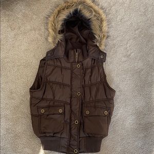 Puffy vest with fur hood